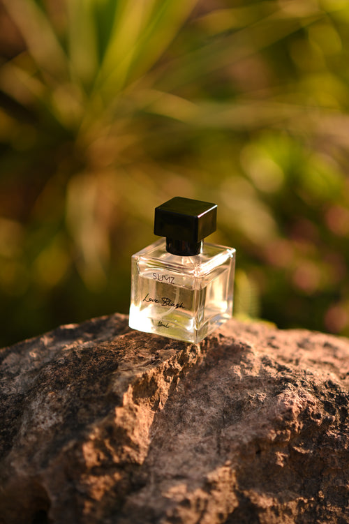 SUMZ Love Blush 50 ml hair perfume bottle outdoors